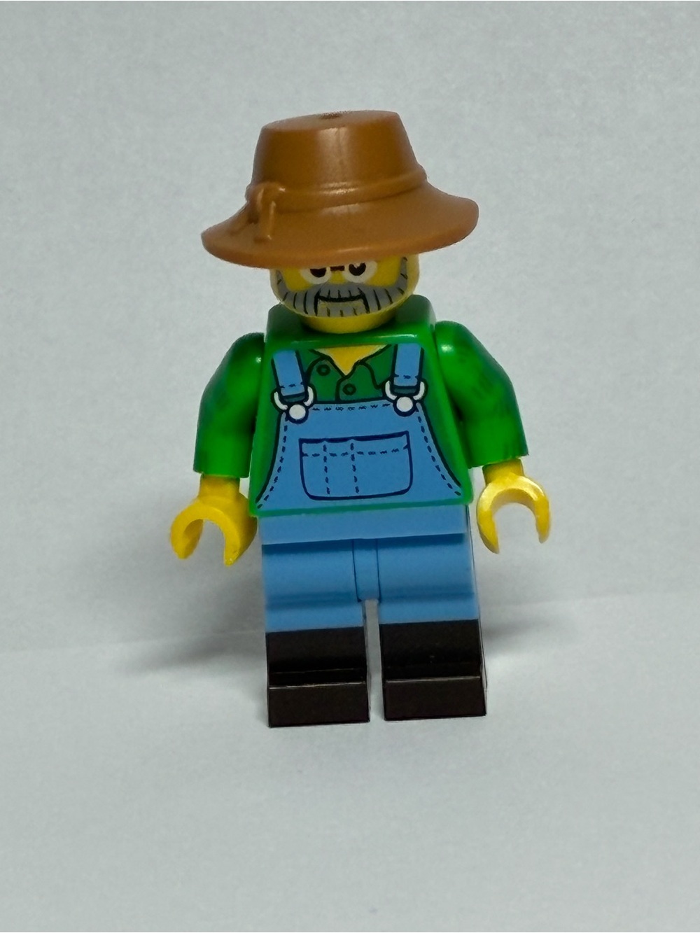 LEGO Farmer Minifigure with Brown Hat and Green Overalls